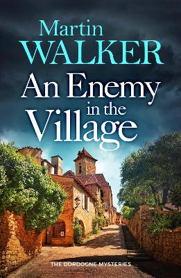 AN ENEMY IN THE VILLAGE PB